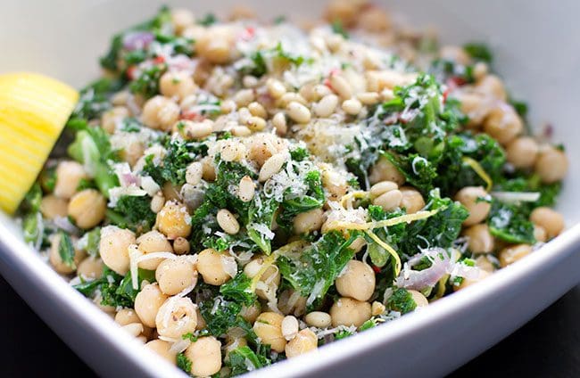 Warm chickpea, curly kale and pine nut salad