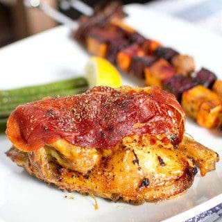 Spatchcock Poussin with Lemon, garlic and Parma ham