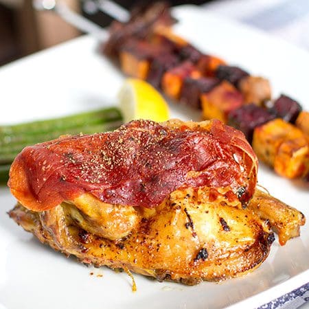 Spatchcock Poussin with Lemon, garlic and Parma ham